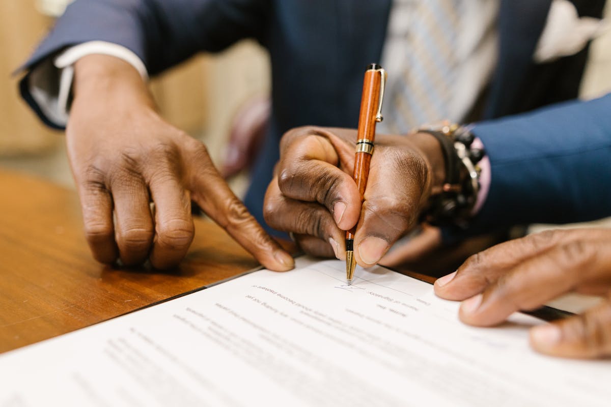 Closing contract signing pen desk