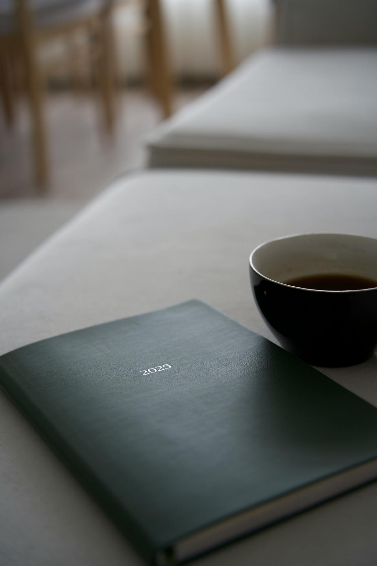 Daily planner notebook coffee desk