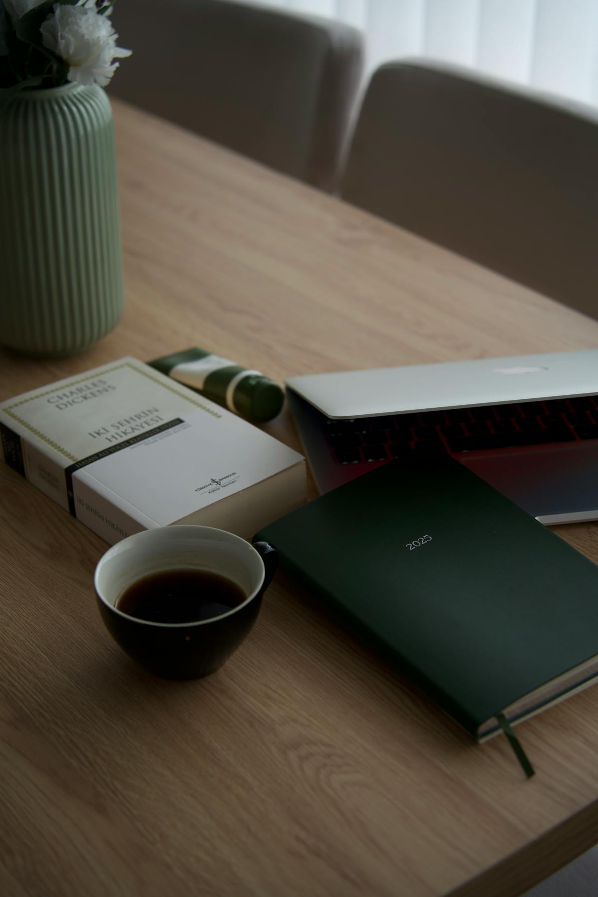 Daily planner notebook coffee desk