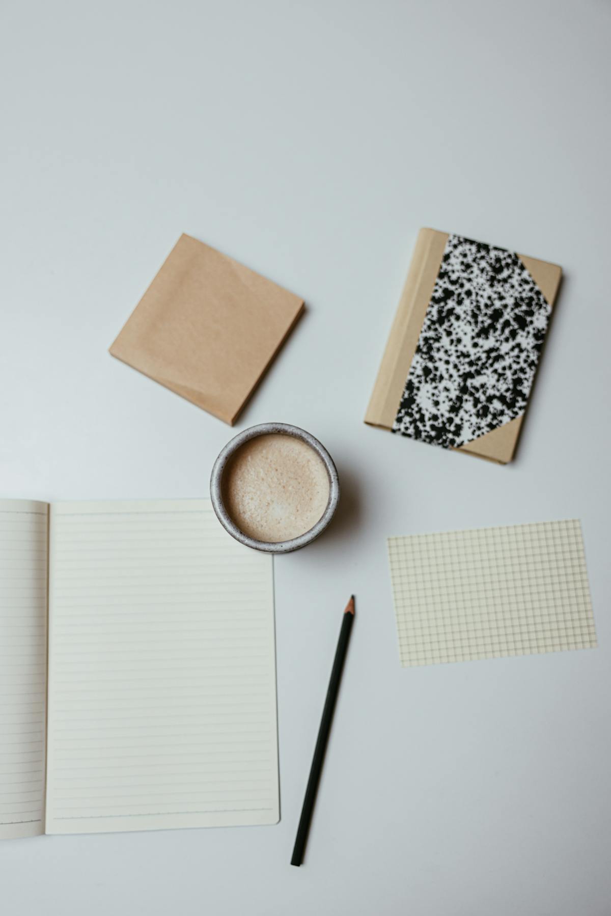 Daily planner notebook coffee desk