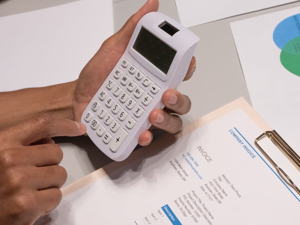 Quotes calculator and invoice on desk
