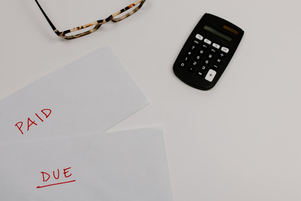 Quotes calculator and invoice on desk