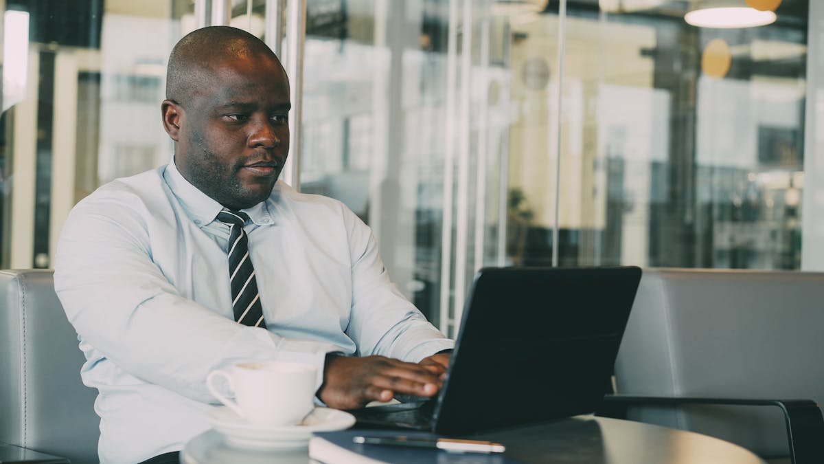 Entrepreneur working laptop office