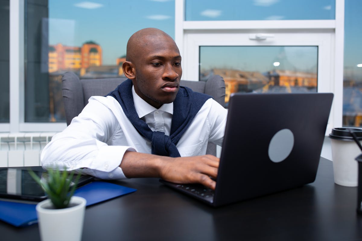 Entrepreneur working laptop office