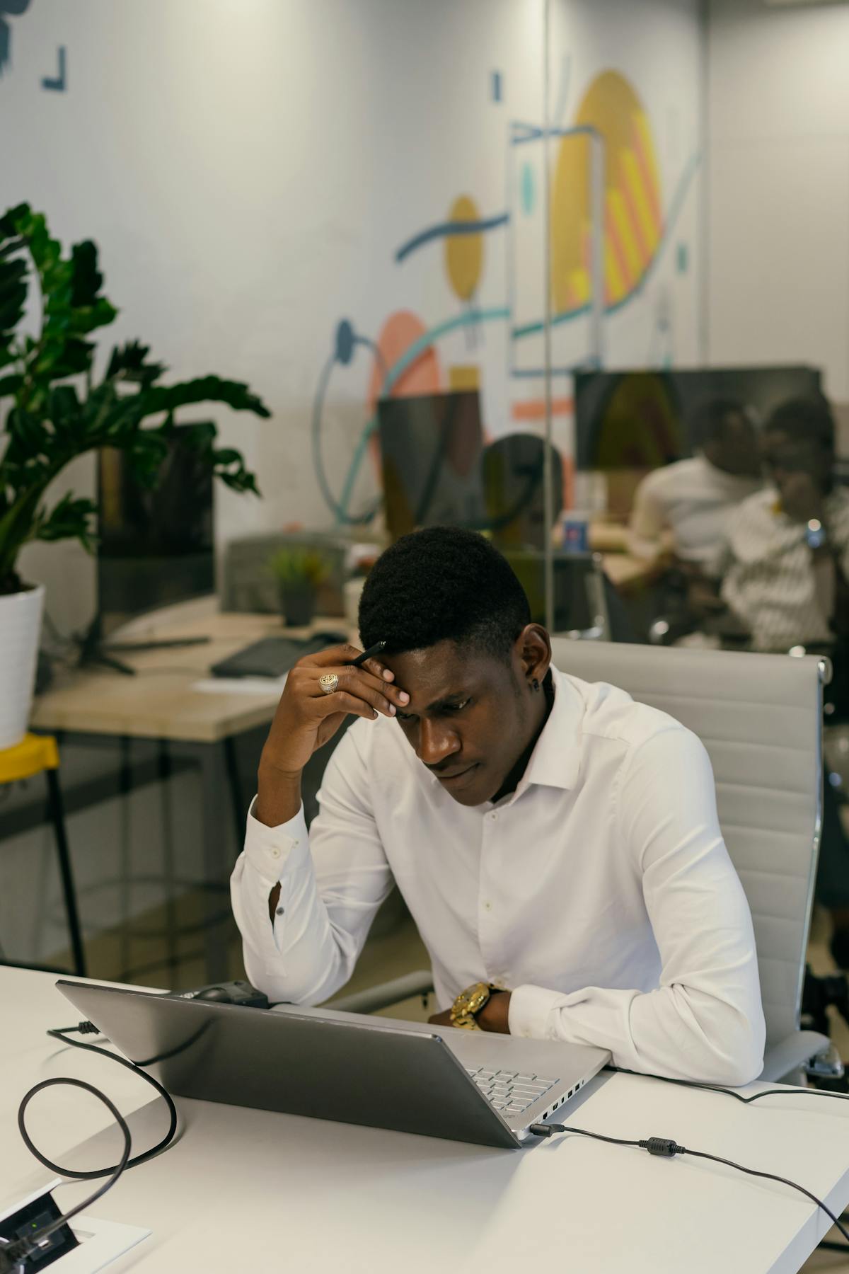 Man working laptop office focused